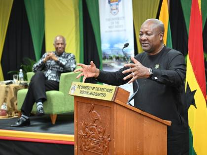President of the Republic of Ghana, His Excellency John Dramani Mahama, addresses a reparatory justice dialogue at the University of the West Indies (UWI) Regional Headquarters on Monday (August 3). Pictured at left is Chairman of the Caribbean Community (