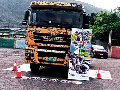 Caribbean Cement Company Limited hosts its Vulnerable Road User Initiative at Rollington Town Primary School in Kingston on June 17, promoting road-safety awareness among students.