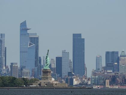 FILE - The New York skyline and Statue of Liberty are seen on May 12, 2025. (AP Photo/Matt Rourke, File)