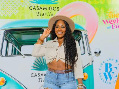 Sasha-Gay Spencer tips her hat to the theme, keeping safari chic cool and carefree with khaki, denim and a wide-brimmed topper.