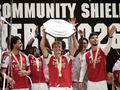 Arsenal’s Martin Odegaard lifts the trophy after his team won the FA Community Shield final match between Arsenal and Manchester City in Cardiff, Wales, Sunday, August 16, 2026. 