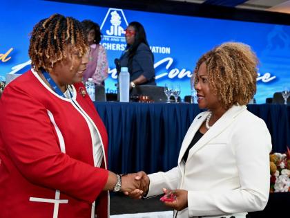 La Sonja Harrison (left), the newly installed president of the Jamaica Teachers’ Association, and Dr Dana Morris Dixon, minister of education, skills, youth, and information, in conversation on the third and final day of the association’s 62nd annual c