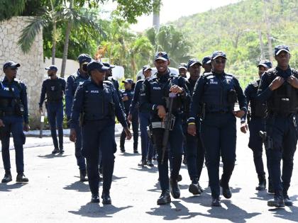 Members of the Jamaica Constabulary Force were on hand during Prime Minister Dr Andrew Holness’s visit to Coopers Pen in Trelawny on Friday.