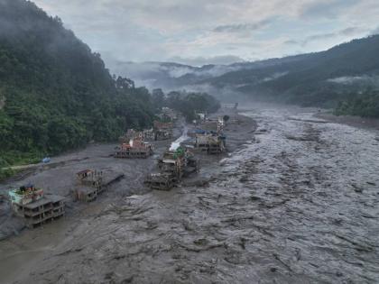 A drone view of the aftermath of flash flooding along the Trishuli river amidst fresh water surge warning in the Trishuli Bazaar area of Nuwakot district, Nepal.