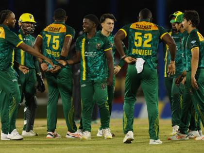 Jamaica Kingsmen players celebrate after their win against the Trinbago Knight Riders on Saturday night at the Queen’s Park Oval in Trinidad and Tobago.