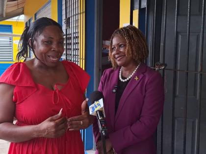 Senator Dr Dana Morris Dixon (right), minister of education, skills, youth and information, listens keenly to Tracie Campbell, principal of Ferris Primary School, in Westmoreland, as she expresses gratitude over the readiness of the institution ahead of ne