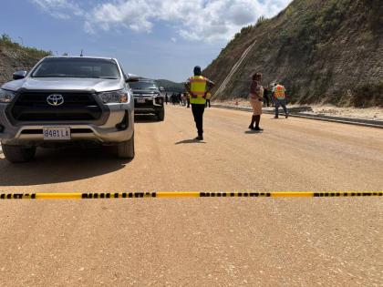 The scene of an accident on the Montego Bay Bypass project near Granville, St James, where engineer Clifton James was crushed to death by a truck yesterday morning. 
