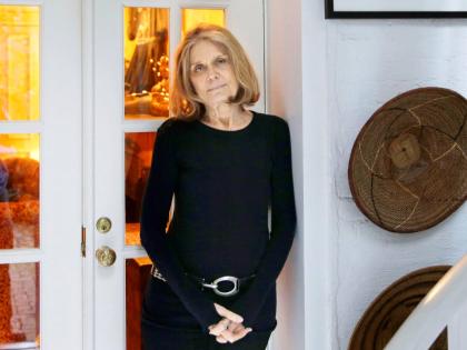 Gloria Steinem poses for a picture at her home in New York on October 19, 2015. 