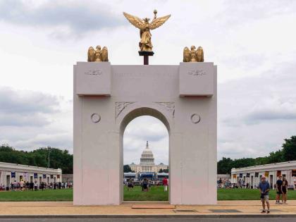 A mockup of President Donald Trump’s proposed triumphal arch stands at the Great American State Fair on the National Mall, in Washington DC. 