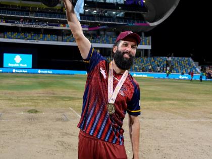 Antigua and Barbuda Captain Moeen Ali raises the Republic Bank Caribbean Premier League trophy after defeating the Jamaica Kingsmen in the fnial on Sunday. 
