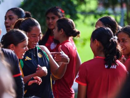 
Reggae Girlz (left) greet their Mexican counterparts ahead of the first of two friendlies between the teams on Friday. The Reggae Girlz won the game 4-3.