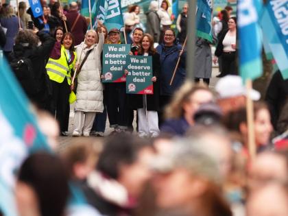 Public sector workers take part in a 24-hour strike over delays in agreeing a new public sector pay deal at Mater Hospital, Dublin, Ireland, Wednesday Oct. 14, 2026. (Brian Lawless/PA via AP)
