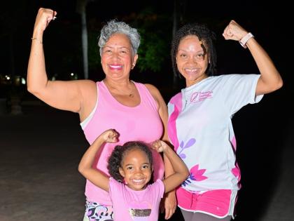 Realtor Elizabeth Oliver (left) joins mother-daughter duo Shari Clarke and little Arya Soman at the second Pink Power weekly workout session.