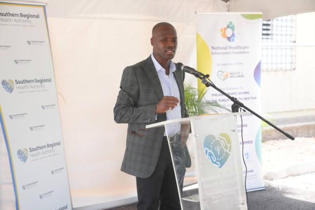 Donor and philanthropist Branatic Neufville giving remarks during the handover ceremony at May Pen Hospital on Thursday, July 16.