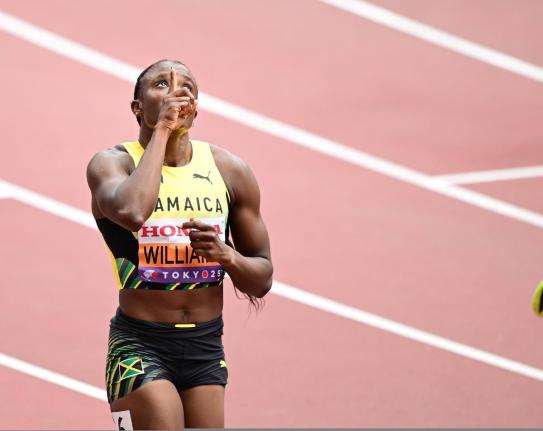 Jamaica’s Danielle Williams raises her eyes to the heavens after qualifying for the semi-finals of the 100m hurdles at the World Athletics Championships.