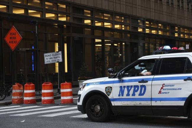 An NYPD cruiser sits at the intersection of a Midtown street closed due to construction, Thursday, November 7, 2024, in New York. 