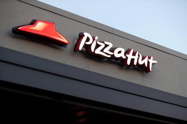 This December 15, 2016, file photo shows a Pizza Hut restaurant in New Orleans. (AP Photo/Gerald Herbert, File)