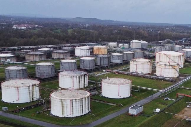 Big oil tanks are pictured in front the BP refinery in Gelsenkirchen, one of the biggest fuel producers in Germany, Wednesday, March 11, 2026. (AP Photo/Martin Meissner)