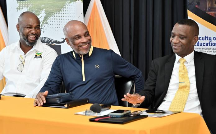 From left: Calbert Hutchinson, president of Jamaica Lacrosse; Christopher Samuda, president of JOA; and Dr. Asburn Pinnock, president of Mico University College, speak at the Jamaica Lacrosse press conference at the Mico University College in Kingston yest