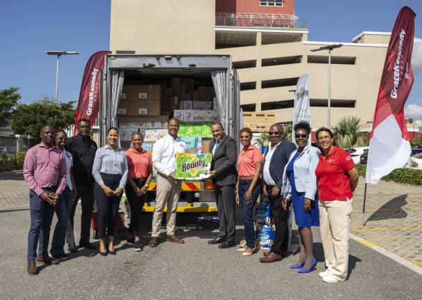 GraceKennedy presents essential hygiene and household products donated by Procter & Gamble to the Ministry of Health and Wellness on March 6 at the GraceKennedy Headquarters in downtown Kingston.
