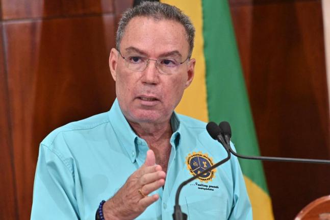 Energy and Transport Minister Daryl Vaz speaking at a post-Cabinet press briefing at Jamaica House on April 15, 2026. 