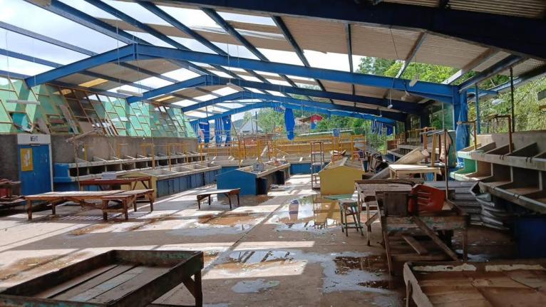 A section of the Claremont Market remains roofless months after Hurricane Melissa.