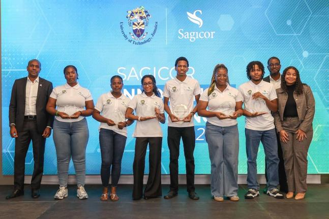 Organisers of the Sagicor-UTech, Ja Innovation Challenge pose with the winning teams following the cheque presentation at the AC Marriott Hotel in Kingston on Tuesday, April 21. From left are Andrew Burke, vice-president of innovation and data at Sagicor G