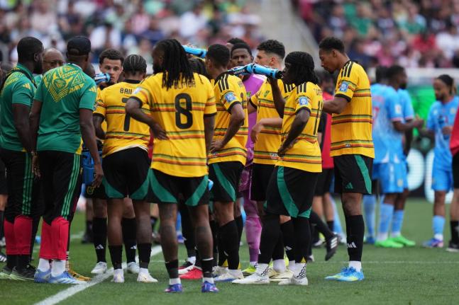 Jamaica’s players take a hydration break during the World Cup playoff final match against DR Congo in Guadalajara, Mexico, Tuesday, March 31, 2026.