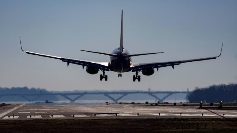 A plane lands at Ronald Reagan Washington National Airport in Arlington, Virginia.