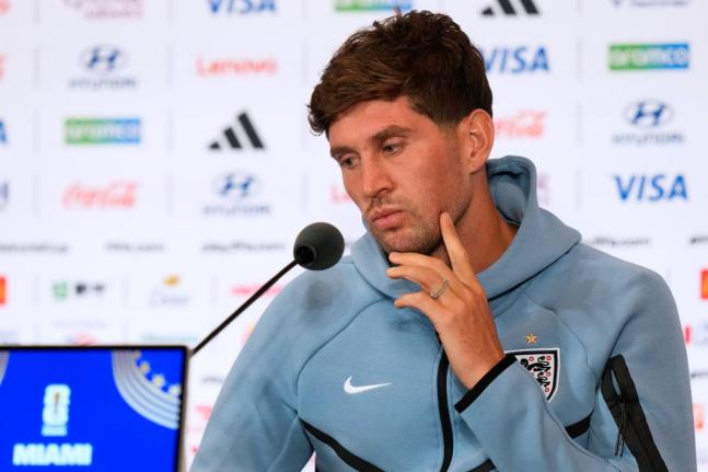 England’s John Stones listens during a news conference ahead of their third-place World Cup  match against France in Miami Gardens, Florida on July 18.
