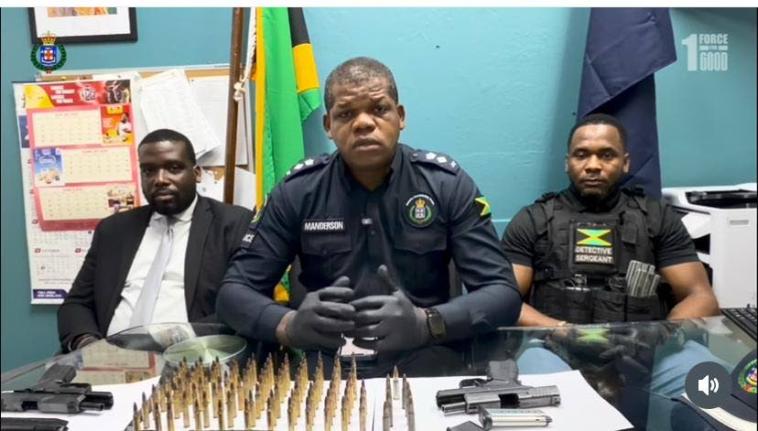 Head of the St Andrew South Police Division, Senior Superintendent Damion Manderson (centre), speaking about an operation on August 4, 2026.
