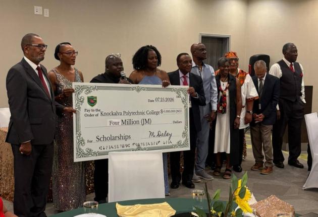 Displaying a $4-million symbolic cheque from the Knockalva International Alumni Association (KIAA) for scholarships to students at Knockalva Polytechnic College (KPC) in Hanover are (from left) L. Anthony Lawrence, chairman of the KPC board; Principal Nata
