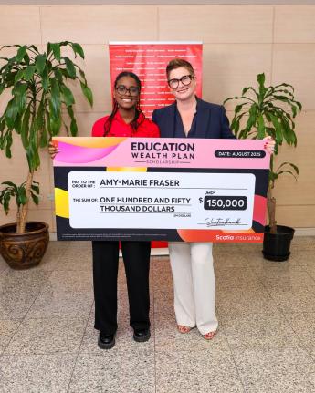  President of Scotia Insurance Jamaica Company Limited, Debra Lopez-Spence (right), poses with one of the 2025 Scholarship recipients, Amy-Marie Frasier.