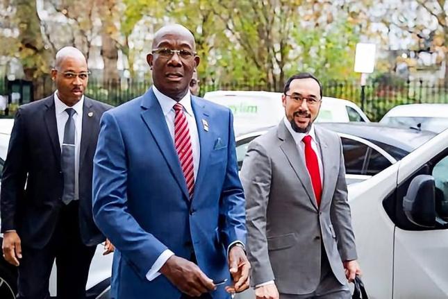 Former prime ministers of Trinidad and Tobago Dr Keith Rowley (centre) and Stuart Young (right).