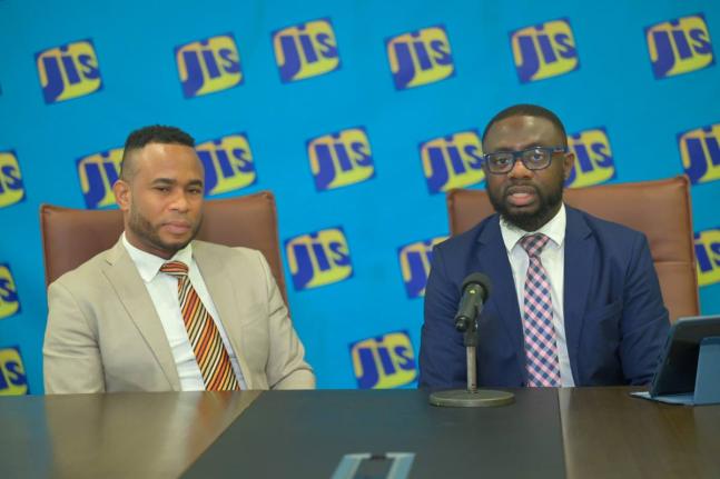 Manager of Debt Recovery Unit in the Client Relationship Management Services department at the Students’ Loan Bureau, Owin Watson (left); and Debt Recovery Unit Supervisor at the Students’ Loan Bureau, Corneilus Hylton.