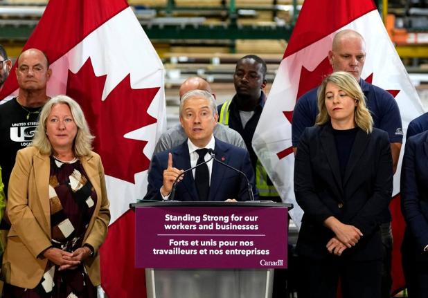 Minister of Finance and National Revenue Francois-Philippe Champagne speaks at a news conference on Canada’s response to US tariffs, at a roofing company in Ottawa on Tuesday.