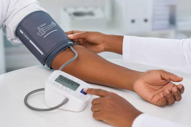 Healthcare personnel will screen patients for hypertension and other medical conditions.