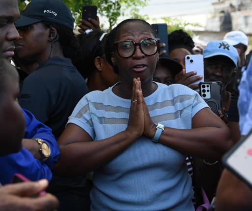 Suzette Campbell, a resident of Coopers Pen, Trelawny, became emotional during the tour of Prime Minister Dr Andrew Holness who was visiting the community yesterday.