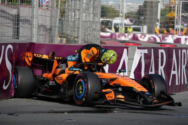 
McLaren driver Lando Norris of Britain gets out of his car after a crash during the Azerbaijan F1 Grand Prix auto race, in Baku, Azerbaijan, yesterday.