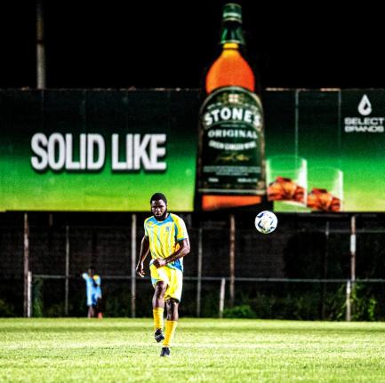 
Waterhouse FC’s Roshawn Amos passes the ball during a Jamaica Premier League football match at Drewsland’s Waterhouse Stadium.