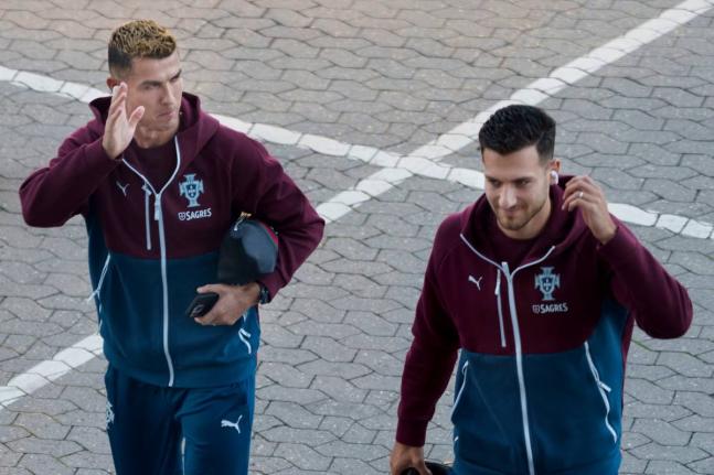 Portugal’s Cristiano Ronaldo (left) and Diogo Dalot arrive for training in Copenhagen, Denmark on Wednesday ahead of their Nations League  match against Denmark. 