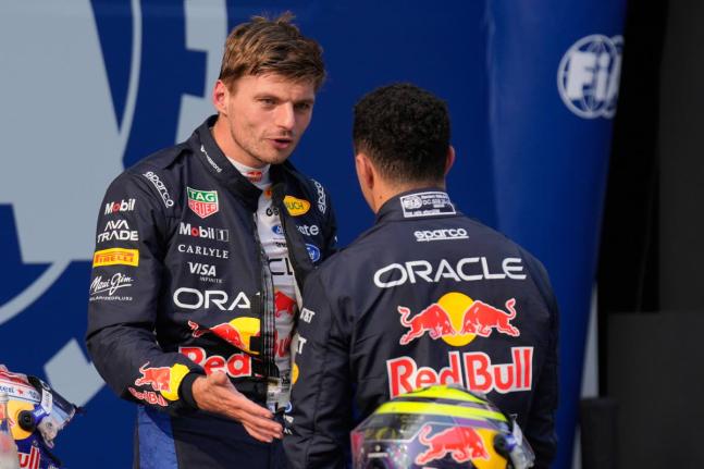
Red Bull driver Max Verstappen of the Netherlands (left) talks with his teammate Isack Hadjar of France after the qualifying session ahead of the Bahrain Grand Prix in Sepang, Malaysia yesterday.