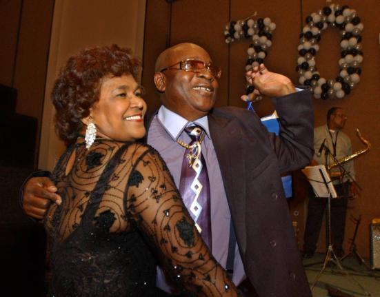 AP 
Calypso star, Slinger Francisco (right), otherwise known as ‘The Mighty Sparrow’, celebrates his 70th birthday dancing calypso with Caribbean community leader Jean Alexander at a reception in his honour in the Brooklyn borough of New York, in this 