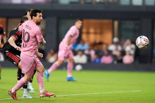 Inter Miami forward Lionel Messi (10) scores his side’s third goal during the second half of an MLS  match against D.C. United, on Saturday, October 10, 2026, in Miami. 