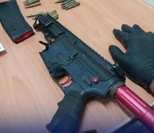 A loaded AR-15 rifle seized by the police in Denham Town in Kingston.