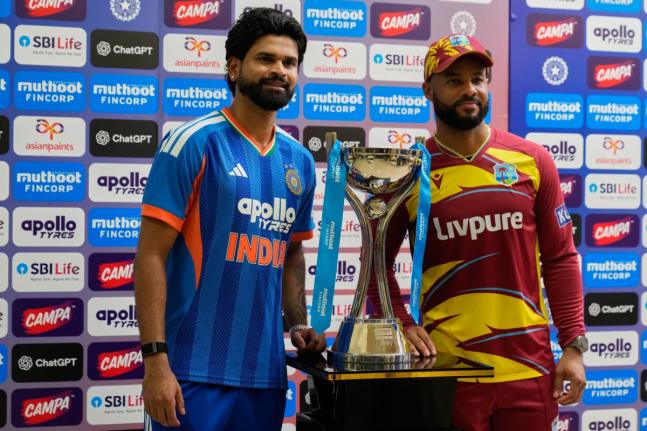 India’s captain Shreyas Iyer (left)  and West Indies’ captain Shai Hope pose with the winners’ trophy after the five-match T20 cricket series between the two countries concluded in a draw, in Bengaluru, India, Saturday, October 17, 2026.  