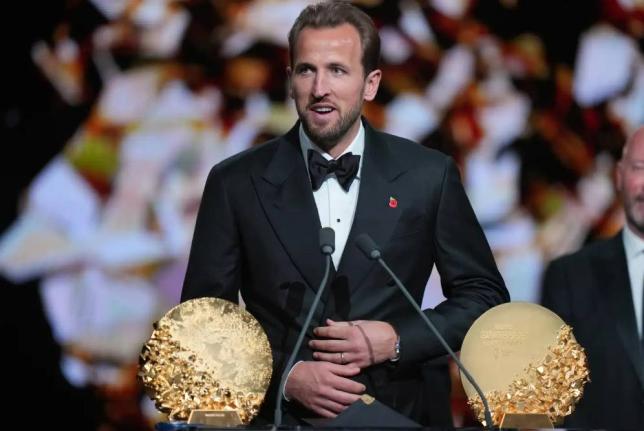 England's football player Harry Kane wins the trophy for striker of the year during the Ballon d'Or ceremony at the London Palladium Theatre in London, England, Monday, October 26, 2026. 