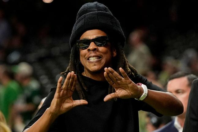 Jay-Z poses on the sidelines at the NFL Super Bowl 59 football game on February 9, 2025, in New Orleans. 
