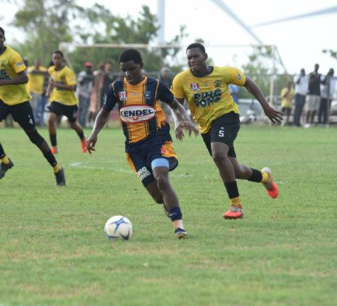 Munro College’s Kajaye Williams (second right) outruns Black River High’s Nickoy White (right) during their ISSA daCosta Cup Zone D preliminary round match at Munro on Tuesday, September 22, 2026.