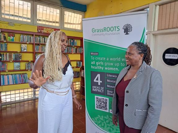 Dr Janice Johnson Dias (left), the president of the New Jersey-based GrassROOTS Community Foundation, talks with Marvetta Stewart-Richards, the regional director for the Jamaica Library Service’s Region Four, following a presentation at the St James Pari